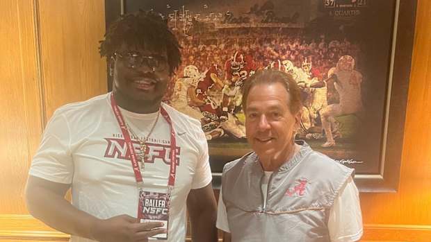 Eddy Pierre-Louis with Nick Saban